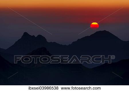 "Sunrise above the peaks of the Allgau Alps, Oberstdorf, Bavaria, Germany, Europe" View Large Photo Image Stock Photo - "Sunrise above the peaks of the Allgau Alps, Oberstdorf, Bavaria, Germany, Europe". Fotosearch