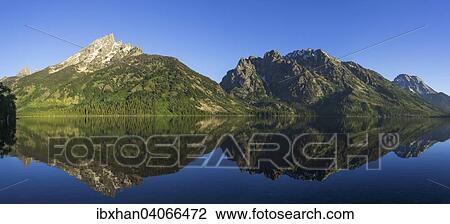 Stock Image - "Sunrise at Jenny Lake, Grand Teton National Park, Wyoming, United States, North America". Fotosearch
