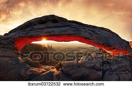 "Sunrise at Mesa Arch stone arch, Canyonlands National Park, near Moab, Utah, United States, North America" View Large Photo Image Stock Image - "Sunrise at Mesa Arch stone arch, Canyonlands National Park, near Moab, Utah, United States, North America". Fotosearch