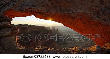 "Sunrise at Mesa Arch stone arch, Canyonlands National Park, near Moab, Utah, United States, North America" View Large Photo Image Stock Image - "Sunrise at Mesa Arch stone arch, Canyonlands National Park, near Moab, Utah, United States, North America". Fotosearch