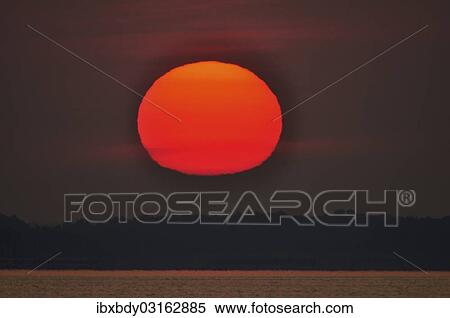 Stock Photography - "Sunrise at Steinhuder Meer or Lake Steinhude, Winzlar, Steinhuder Meer, Lower Saxony, Germany, Europe". Fotosearch