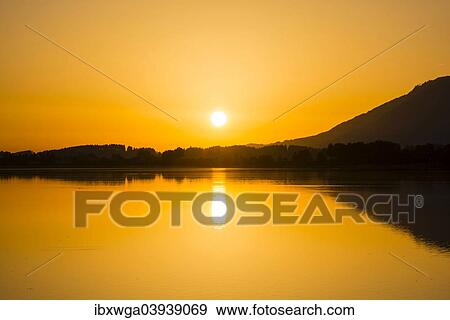 Stock Photo - "Sunrise, Forggensee Lake, Ostallgau, Allgau, Swabia, Bavaria, Germany, Europe". Fotosearch