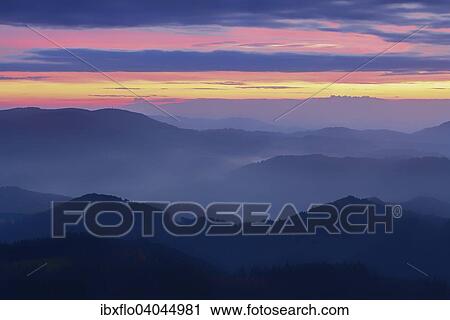 Stock Image - "Sunrise in the Black Forest, Baden-Wurttemberg, Germany, Europe". Fotosearch