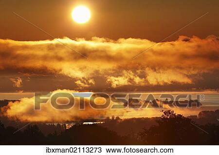 "Sunrise, lake Chiemsee and Frauenchiemsee island, also known as Fraueninsel island, view from Ratzinger Hoehe, Chiemgau, Upper Bavaria, Bavaria, Germany, Europe" View Large Photo Image Stock Image - "Sunrise, lake Chiemsee and Frauenchiemsee island, also known as Fraueninsel island, view from Ratzinger Hoehe, Chiemgau, Upper Bavaria, Bavaria, Germany, Europe". Fotosearch