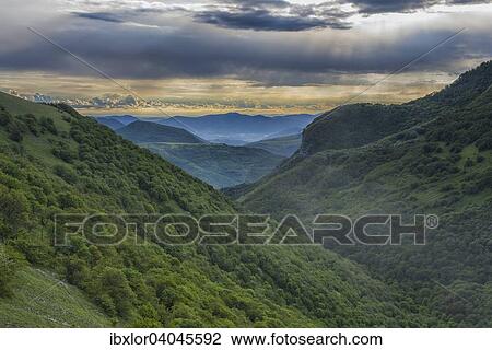 "Sunrise on a stormy day, Mount Cucco Regional Park, Umbria, Italy, Europe" View Large Photo Image Stock Image - "Sunrise on a stormy day, Mount Cucco Regional Park, Umbria, Italy, Europe". Fotosearch