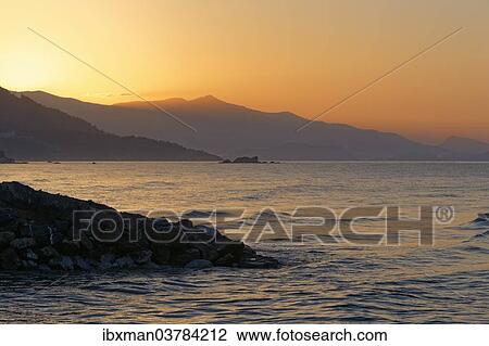 Stock Image - "Sunrise on the coast of Anamur, Mersin Province, Turkish Riviera, Turkey, Asia". Fotosearch