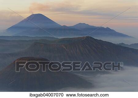 "Sunrise over the smoking Gunung Bromo volcano, Bromo-Tengger-Semeru National Park, Java, Indonesia, Asia" View Large Photo Image Stock Image - "Sunrise over the smoking Gunung Bromo volcano, Bromo-Tengger-Semeru National Park, Java, Indonesia, Asia". Fotosearch