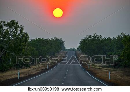 "Sunset above a road, Kakadu National Park, Northern Territory, Australia, Oceania" View Large Photo Image Stock Photo - "Sunset above a road, Kakadu National Park, Northern Territory, Australia, Oceania". Fotosearch