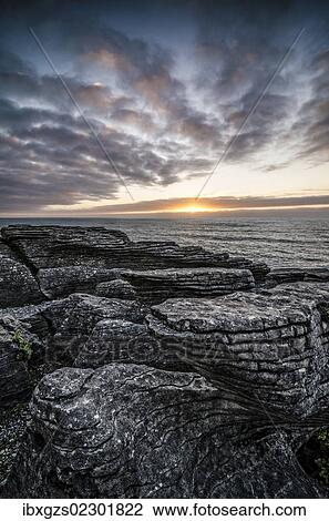 "Sunset at Pancake Rocks, Paparoa National Park, Punakaiki, South Island, New Zealand, Oceania" View Large Photo Image Stock Image - "Sunset at Pancake Rocks, Paparoa National Park, Punakaiki, South Island, New Zealand, Oceania". Fotosearch