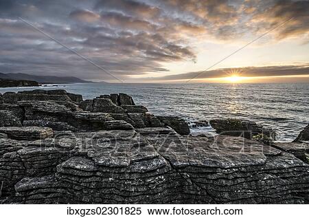 "Sunset at Pancake Rocks, Paparoa National Park, Punakaiki, South Island, New Zealand, Oceania" View Large Photo Image Stock Photography - "Sunset at Pancake Rocks, Paparoa National Park, Punakaiki, South Island, New Zealand, Oceania". Fotosearch