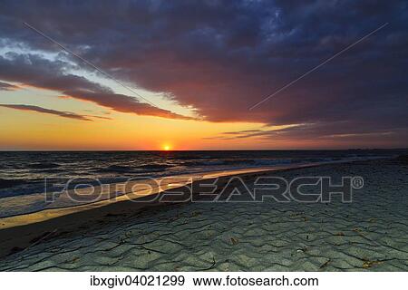 "Sunset at sea with cloudy sky, Mari Ermi, Sinis Peninsula, Province of Oristano, Sardinia, Italy, Europe" View Large Photo Image Stock Photo - "Sunset at sea with cloudy sky, Mari Ermi, Sinis Peninsula, Province of Oristano, Sardinia, Italy, Europe". Fotosearch
