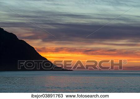 Stock Image - "Sunset at the coast, near Tungeneset, Senja, Norway, Europe". Fotosearch