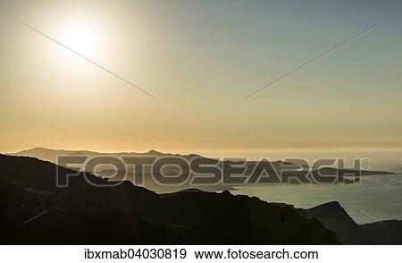 Stock Photo - "Sunset by the sea, Gulf of Saint-Florent, Corsica, France, Europe". Fotosearch