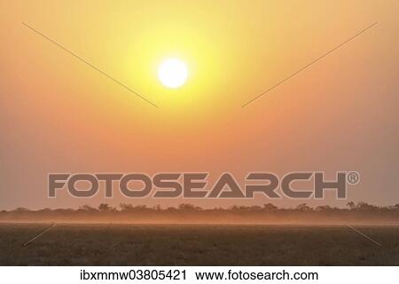 Stock Image - "Sunset, Etosha National Park, Namibia, Africa". Fotosearch