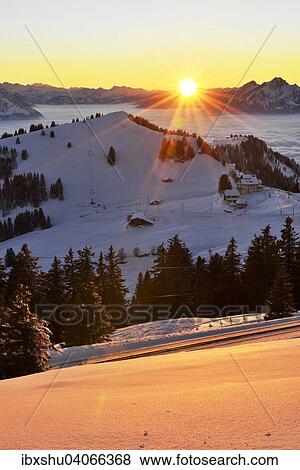 Stock Photo - "Sunset from Mt Rigi Kulm with views of the mountains Rigi Staffel and Pilatus, Canton of Schwyz, Switzerland, Europe". Fotosearch