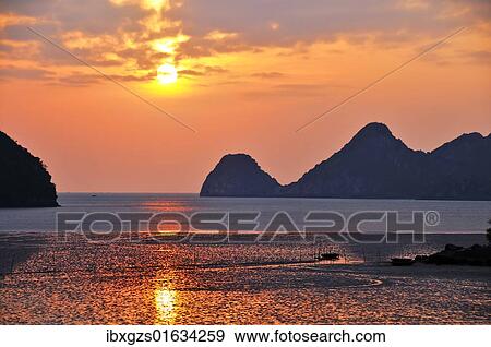 "Sunset in Cat Ba, Halong Bay, Vietnam, Southeast Asia, Asia" View Large Photo Image Stock Photo - "Sunset in Cat Ba, Halong Bay, Vietnam, Southeast Asia, Asia". Fotosearch