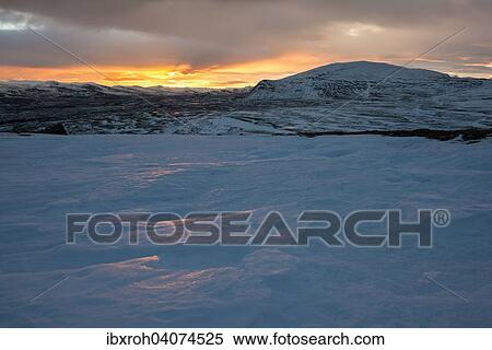 "Sunset in the wintry Fjell, Dovrefjell- Sunndalsfjella National Park, Norway, Europe" View Large Photo Image Stock Photography - "Sunset in the wintry Fjell, Dovrefjell- Sunndalsfjella National Park, Norway, Europe". Fotosearch