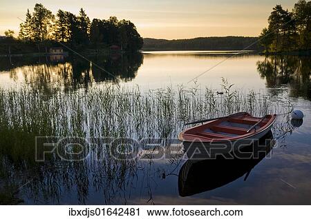 "Sunset on a lake near Bengtsfors, Sweden, Europe" View Large Photo Image Stock Image - "Sunset on a lake near Bengtsfors, Sweden, Europe". Fotosearch