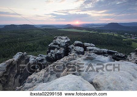 "Sunset on Gohrisch hill, Elbe Sandstone Mountains, Saxony, Germany, Europe" View Large Photo Image Stock Photo - "Sunset on Gohrisch hill, Elbe Sandstone Mountains, Saxony, Germany, Europe". Fotosearch