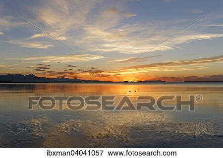 "Sunset on Lake Chiemsee in Chieming, Chiemgau, Upper Bavaria, Bavaria, Germany, Europe" View Large Photo Image Stock Photo - "Sunset on Lake Chiemsee in Chieming, Chiemgau, Upper Bavaria, Bavaria, Germany, Europe". Fotosearch