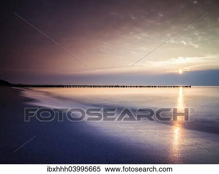 "Sunset on the beach of Ahrenshoop, Fischland, Mecklenburg-Western Pomerania, Germany, Europe" View Large Photo Image Stock Photography - "Sunset on the beach of Ahrenshoop, Fischland, Mecklenburg-Western Pomerania, Germany, Europe". Fotosearch