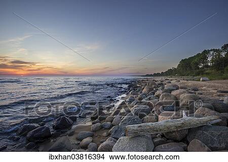 "Sunset on the coast of the Baltic sea in the Gulf of Riga, Tuja, Salacgrivas novads, Latvia, Europe" View Large Photo Image Picture - "Sunset on the coast of the Baltic sea in the Gulf of Riga, Tuja, Salacgrivas novads, Latvia, Europe". Fotosearch