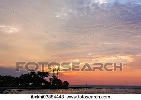 Stock Image - "Sunset on the Kohala Coast, Big Island, Hawaii, United States, North America". Fotosearch