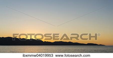 Stock Image - "Sunset on the sea, Corsica, Frankreich". Fotosearch