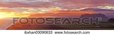 "Sunset on the south coast, with Eyjafjallajoekull at the rear, Dyrholaey, Vik i Myrdal, Southern Region, Iceland, Europe" View Large Photo Image Stock Image - "Sunset on the south coast, with Eyjafjallajoekull at the rear, Dyrholaey, Vik i Myrdal, Southern Region, Iceland, Europe". Fotosearch