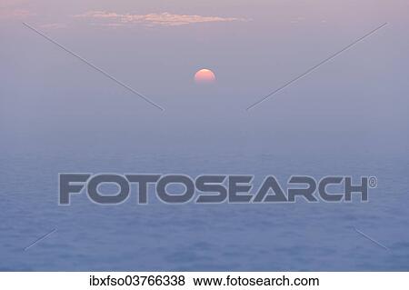 "Sunset over a snow-covered meadow, Thuringia, Germany, Europe" View Large Photo Image Stock Photo - "Sunset over a snow-covered meadow, Thuringia, Germany, Europe". Fotosearch