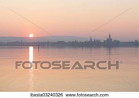 Stock Photograph - "Sunset over Lake Constance at Konstanz, Lake Constanz, Konstanz, Baden-Wurttemberg, Germany, Europe". Fotosearch