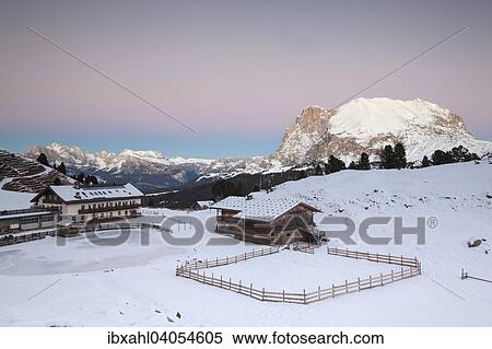 Stock Photography - "Sunset over Plattkofel and Mahlknechthutte hut in winter, Saltria, Province of South Tyrol, Italy, Europe". Fotosearch