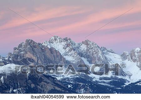 Stock Photo - "Sunset over the Geisler peaks in winter, Saltria, Province of South Tyrol, Italy, Europe". Fotosearch