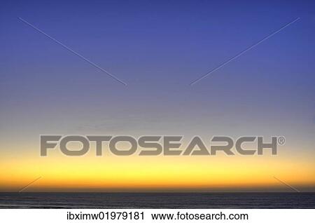 Stock Image - "Sunset over the sea, El Cotillo, Fuerteventura, Canary Islands, Spain, Europe". Fotosearch