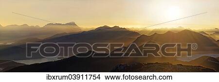 "Sunset with view on the Jachenau with Walchensee and Zugspitze with Wetterstein range, Benediktenwand, Lenggries, Upper Bavaria, Bavaria, Germany, Europe" View Large Photo Image Picture - "Sunset with view on the Jachenau with Walchensee and Zugspitze with Wetterstein range, Benediktenwand, Lenggries, Upper Bavaria, Bavaria, Germany, Europe". Fotosearch