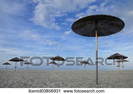 "Sunshades on the beach, near Bastia, Corsica, France, Europe" View Large Photo Image Stock Image - "Sunshades on the beach, near Bastia, Corsica, France, Europe". Fotosearch
