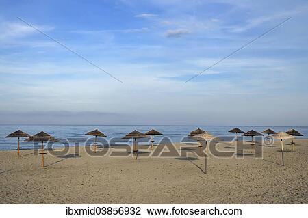 "Sunshades on the beach, near Bastia, Corsica, France, Europe" View Large Photo Image Stock Image - "Sunshades on the beach, near Bastia, Corsica, France, Europe". Fotosearch