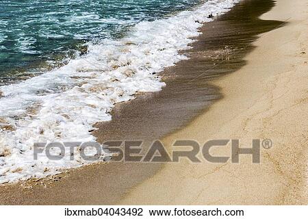 "Surf on a sandy beach, Corsica, France, Europe" View Large Photo Image Stock Image - "Surf on a sandy beach, Corsica, France, Europe". Fotosearch