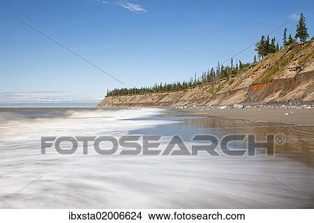 Picture - "Surf on the beach of Kenai on the Kenai Peninsula, Cook Inlet, Alaska, USA". Fotosearch