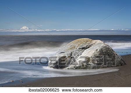 "Surf on the beach of Kenai on the Kenai Peninsula with Mount Redoubt volcano, Cook Inlet, Alaska, USA" View Large Photo Image Stock Photography - "Surf on the beach of Kenai on the Kenai Peninsula with Mount Redoubt volcano, Cook Inlet, Alaska, USA". Fotosearch