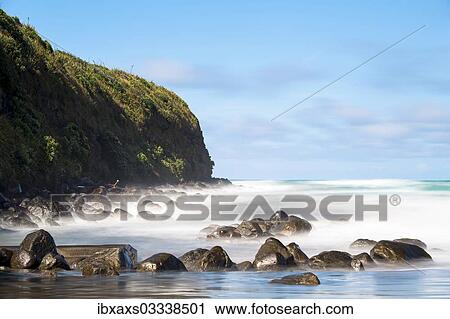 "Surf washing over rocks on the beach, Opunake, Taranaki Region, New Zealand, Oceania" View Large Photo Image Stock Image - "Surf washing over rocks on the beach, Opunake, Taranaki Region, New Zealand, Oceania". Fotosearch