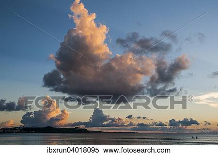 "Surfer at sunset in Guam, US Territory, Central Pacific" View Large Photo Image Stock Photography - "Surfer at sunset in Guam, US Territory, Central Pacific". Fotosearch