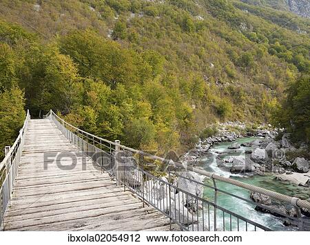 "Suspension bridge across the turqouise Soca river in Soca Valley near Bovec, Triglav National Park, Slovenia, Europe" View Large Photo Image Stock Image - "Suspension bridge across the turqouise Soca river in Soca Valley near Bovec, Triglav National Park, Slovenia, Europe". Fotosearch