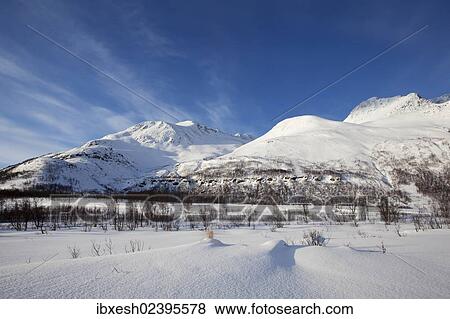 Stock Photo - "Svarthamartinden mountain in winter, Tromso, Norway, Europe". Fotosearch