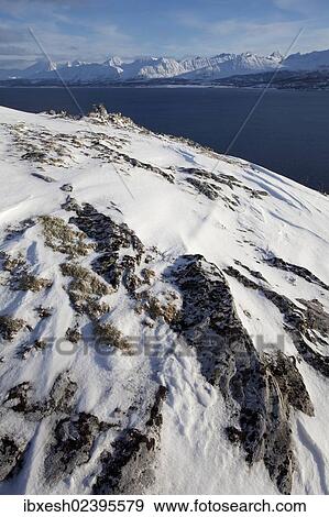 "Svarthamartinden mountain in winter, Tromso, Norway, Europe" View Large Photo Image Stock Photo - "Svarthamartinden mountain in winter, Tromso, Norway, Europe". Fotosearch