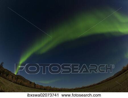 "Swirling Northern lights, Polar Aurorae, Aurora Borealis, green, near Whitehorse, Yukon Territory, Canada, North America" View Large Photo Image Stock Image - "Swirling Northern lights, Polar Aurorae, Aurora Borealis, green, near Whitehorse, Yukon Territory, Canada, North America". Fotosearch