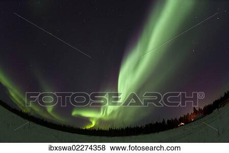 "Swirling northern polar lights, Aurora Borealis, green, near Whitehorse, Yukon Territory, Canada, North America" View Large Photo Image Stock Photo - "Swirling northern polar lights, Aurora Borealis, green, near Whitehorse, Yukon Territory, Canada, North America". Fotosearch