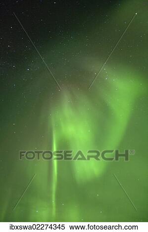 "Swirling northern polar lights, Aurora Borealis, green, near Whitehorse, Yukon Territory, Canada, North America" View Large Photo Image Stock Photography - "Swirling northern polar lights, Aurora Borealis, green, near Whitehorse, Yukon Territory, Canada, North America". Fotosearch