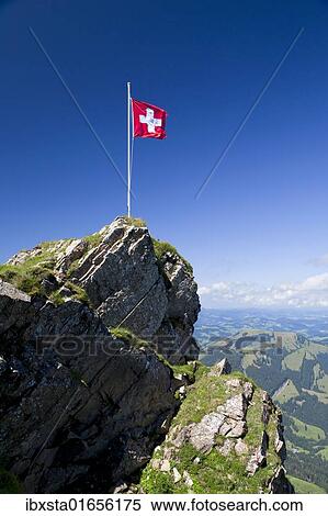 Stock Photography - "Swiss flag on a mountain in the Alpstein Range, Appenzell, Switzerland, Alps, Europe". Fotosearch