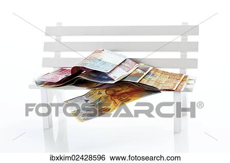 Swiss franc banknotes on a wooden bench View Large Photo Image Stock Photograph - Swiss franc banknotes on a wooden bench. Fotosearch
